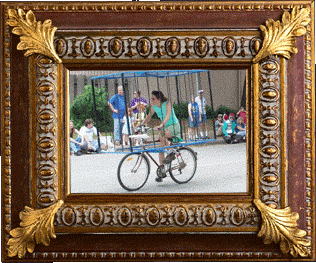 A girl on a bicycle! A girl on a bicycle!