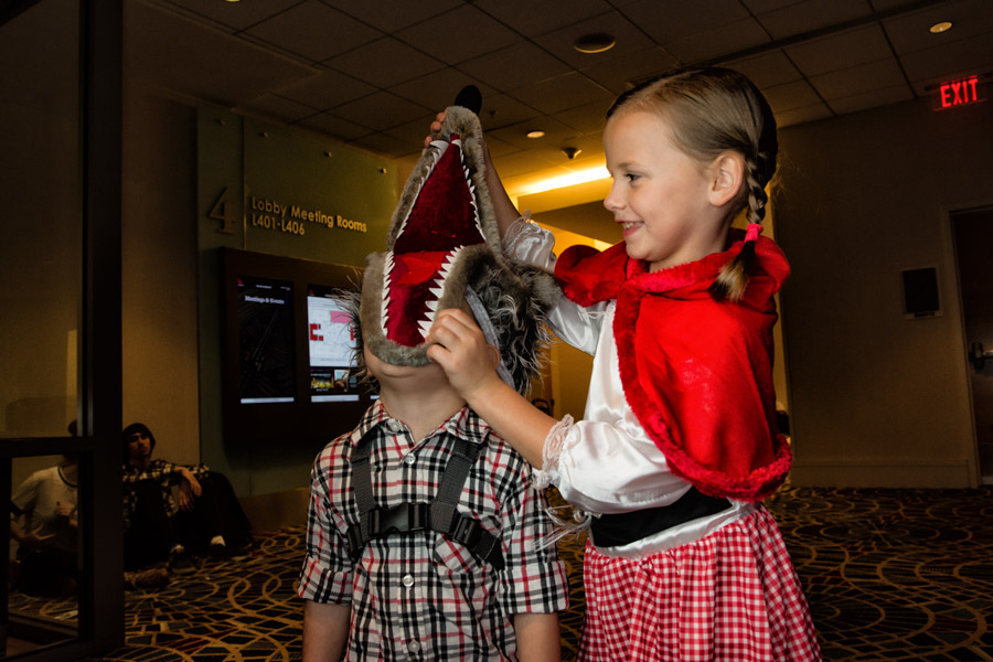 Helpful big sister at Dragon Con photo