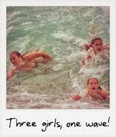 Three girls, one wave! Three girls, one wave!