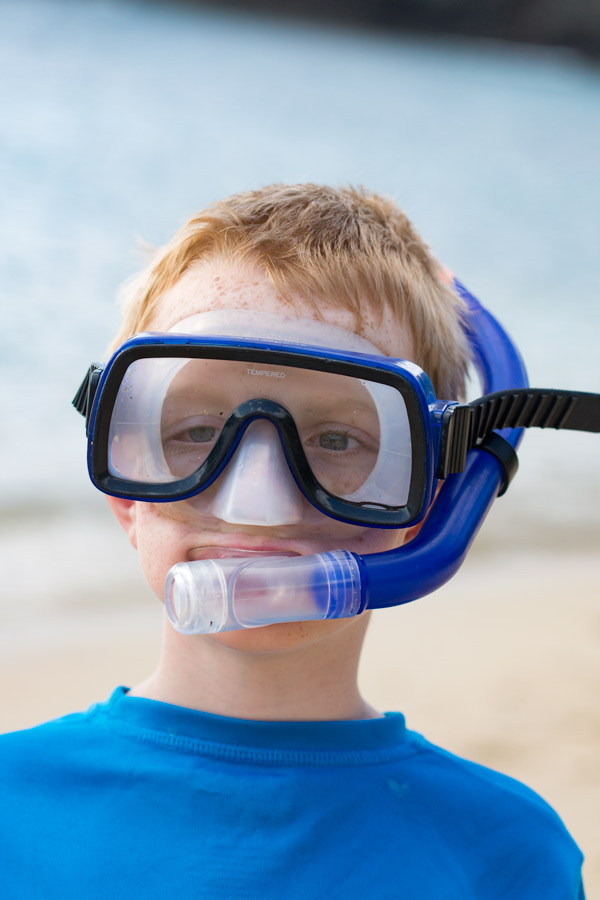 Child with snorkeling mask in Hawaii photo