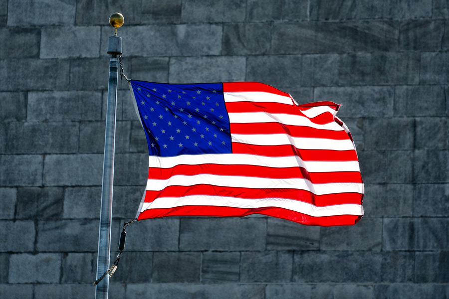 United States flag at Washington monument photo
