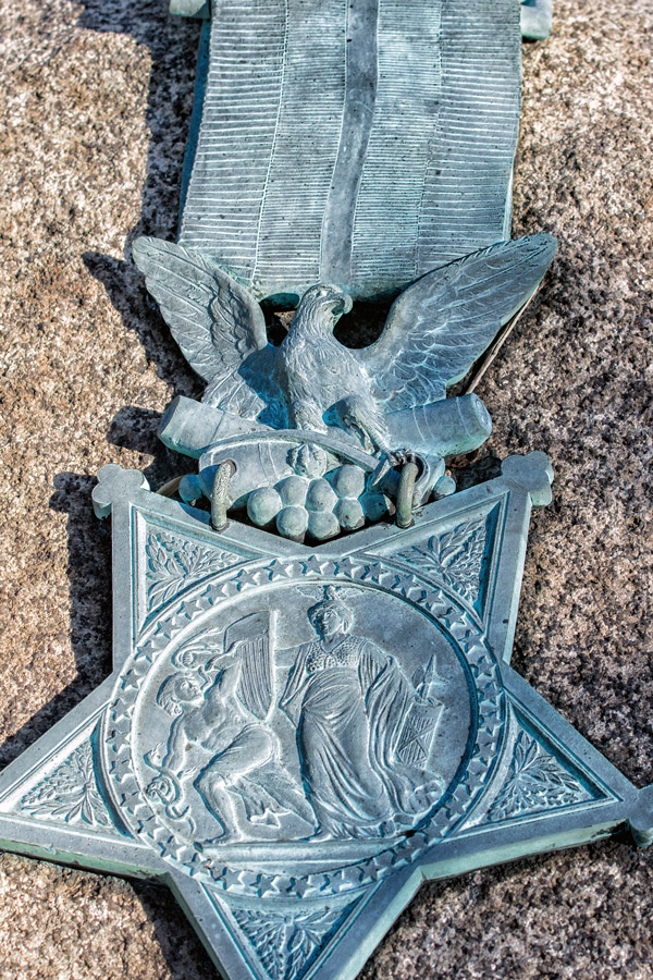 Bronze insignia at Arlington Cemetery photo