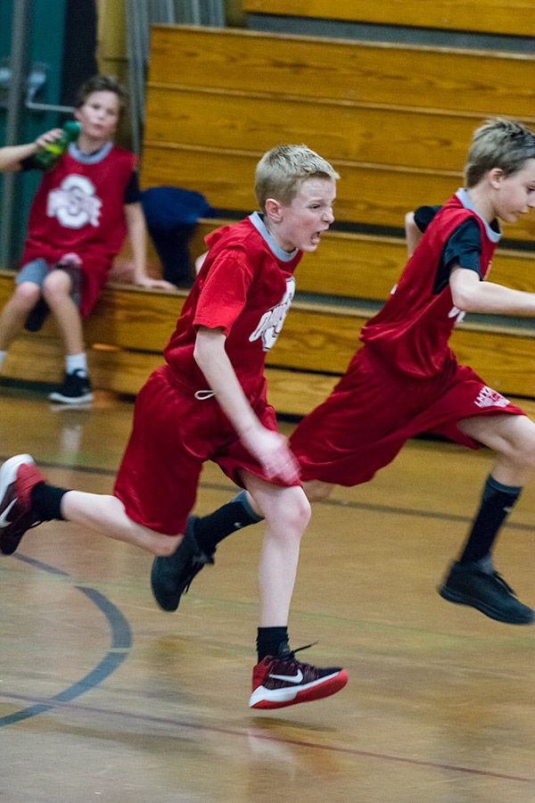 Tobias charging basketball photo