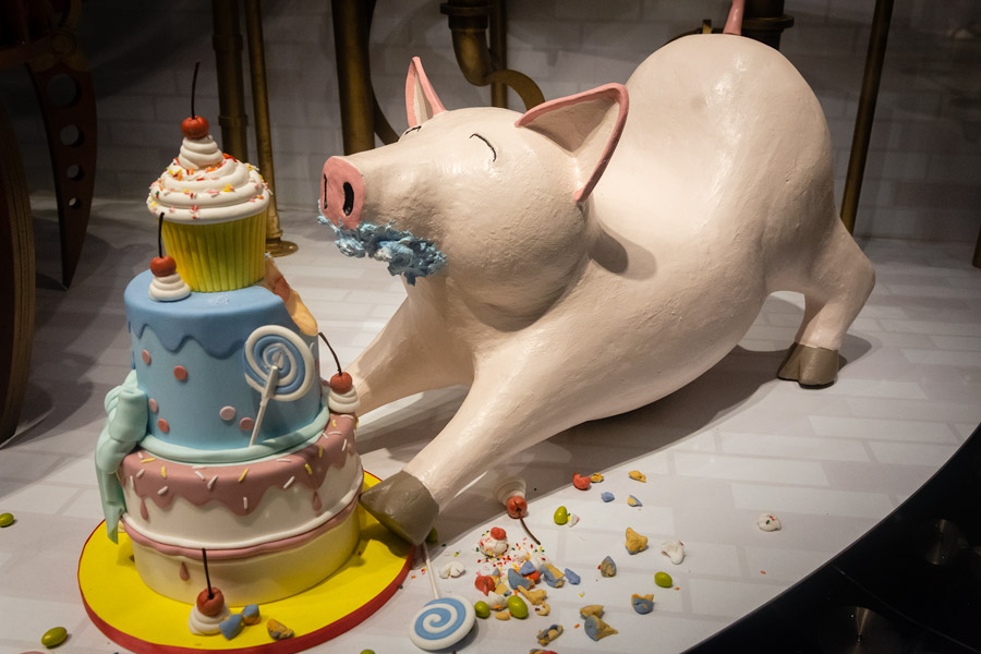 Pig eating cake photo
