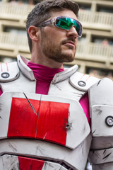 Benjamin Moon in white and pink Mass Effect armor cosplay photo